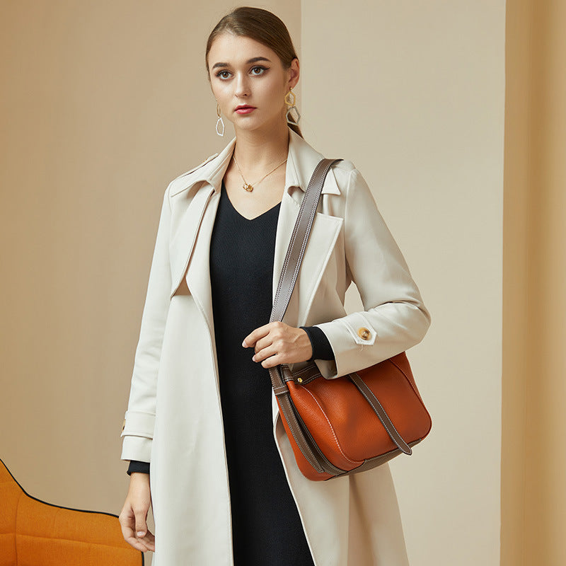 Hand-held top grain bucket bag female color matching high-end shoulder bag niche messenger bag tide