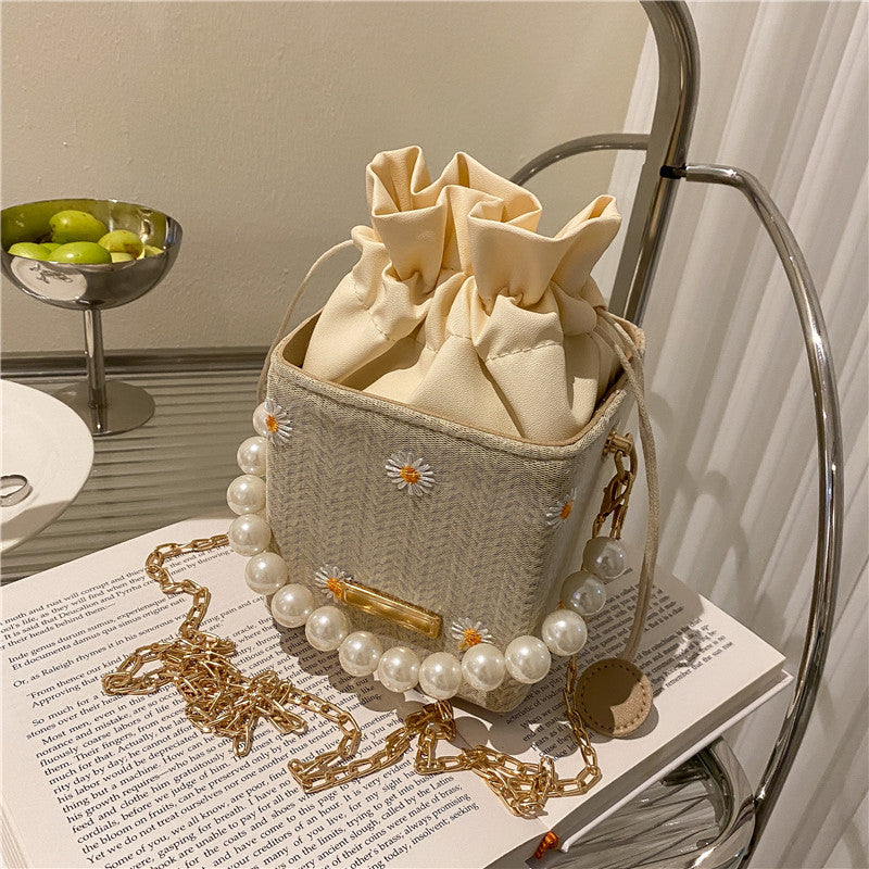 Popular bag women’s 2026 new beach bucket bag straw pearl chain shoulder messenger bag